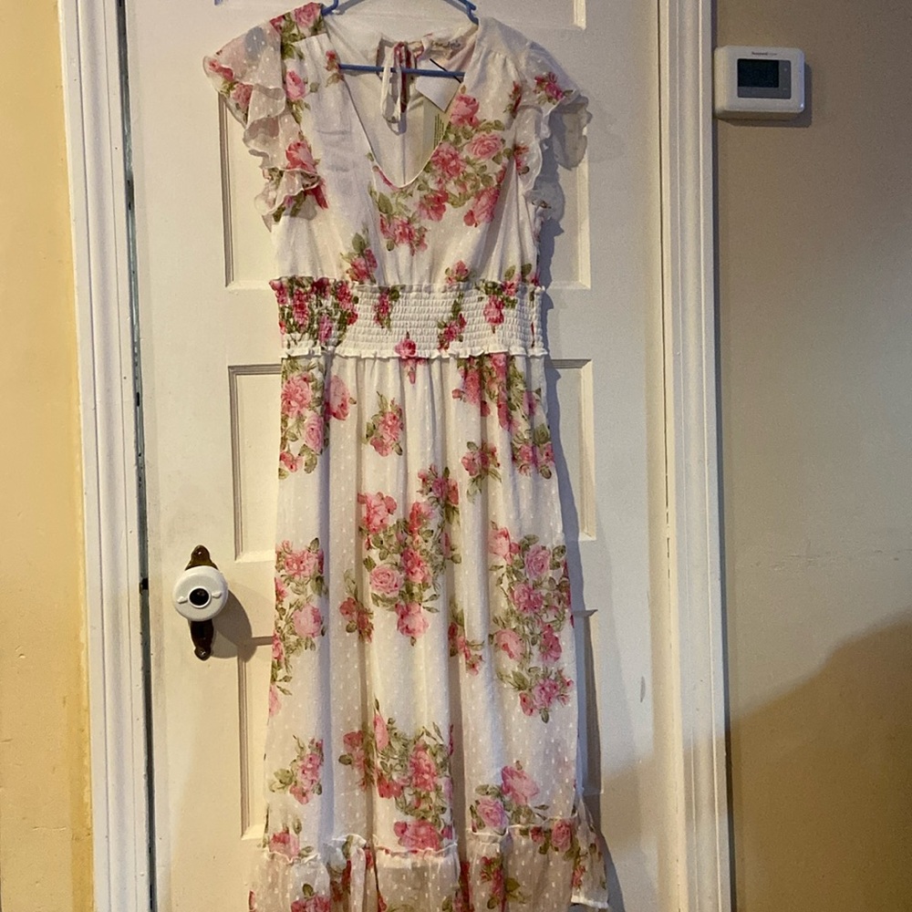 I am selling a White dress with Pink flowers size US X-Large